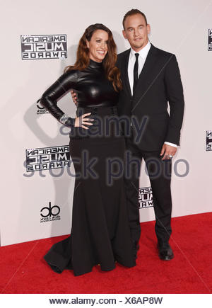 Alanis Morissette and her husband Mario Treadway out and about in Stock