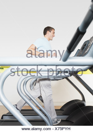 Man on treadmill in health club