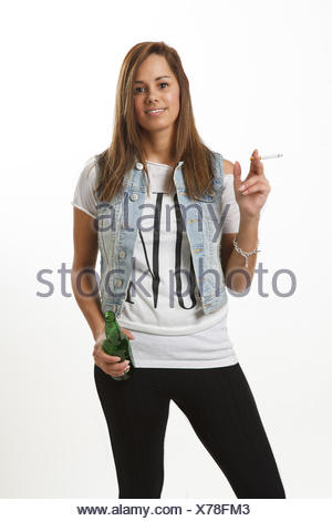 teenage girl smoking with a bottle of alcohol Stock Photo: 16355762 - Alamy