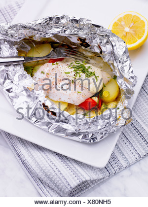 Fish in aluminum foil Stock Photo: 26829747 - Alamy