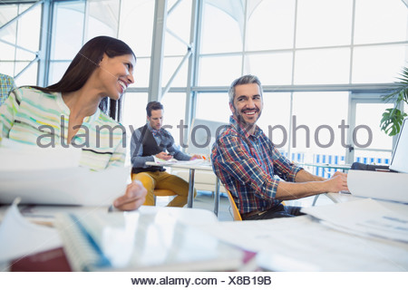 images of people talking inside the office