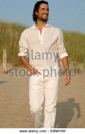 man walking clothes beach wearing dunes alamy