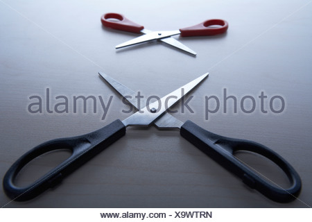 Two pairs of scissors open and facing each other Stock Photo: 23816576 ...