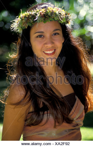 Portrait of a part Hawaiian young woman wearing a haku head lei Stock ...