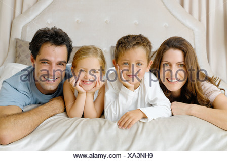 Children Three Together Sleeping On Bed Stock Photo 
