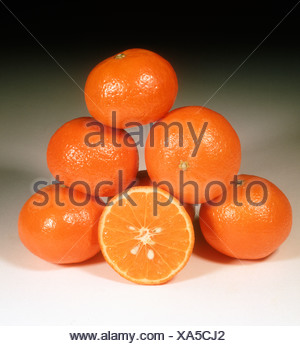 Group of madarin fruit whole sectioned variety Imperial Stock Photo