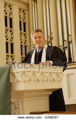 Priest standing at pulpit Stock Photo: 17106131 - Alamy