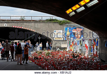People mourn for the victims of Love Parade disaster in Duisburg Stock
