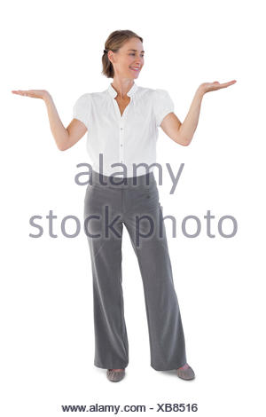 Businesswoman presenting something with her two hands raised Stock ...