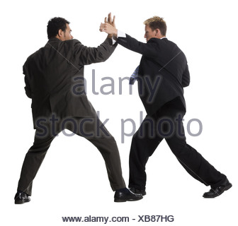 Two businessmen fighting Stock Photo - Alamy