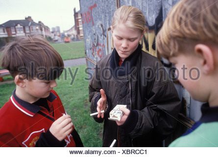 children smoking behind the bike shed Stock Photo: 9559656 