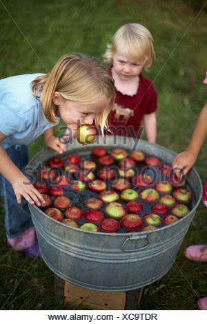 Children apple bobbing Stock Photo: 47396640 - Alamy