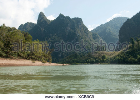 Karst landscape, forested mountains on the Nam Ou River in Muang Ngoi Kao, Luang Prabang province, Laos, Southeast Asia, Asia