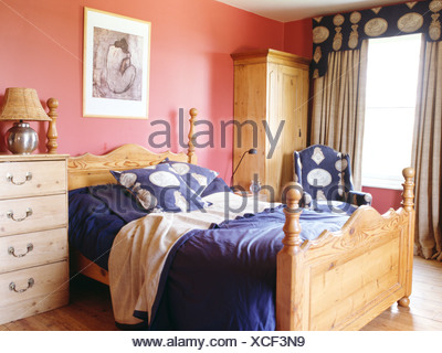 Cream Wardrobe In Bedroom With Pink Curtains And Cream Red Throw