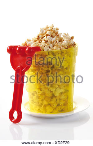 Download Popcorn In A Yellow Plastic Bucket Stock Photo Alamy Yellowimages Mockups