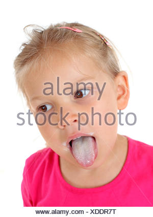 Little girl showing her milk tongue Stock Photo: 145114226 - Alamy