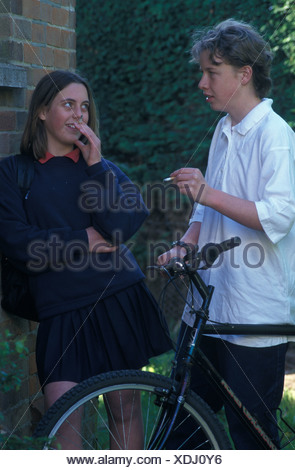 children smoking behind the bike shed Stock Photo: 9559656 