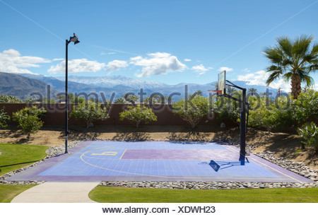 Empty basketball court with light pole Stock Photo Alamy