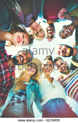 Friends Huddle Join Holiday Party Group Concept
