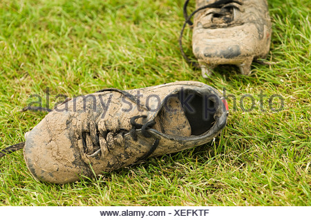 Muddy football boots Stock Photo: 21827182 - Alamy