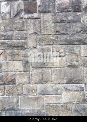 Stein Wand Textur mit großen Ziegelsteinen auf alten historischen Stadtmauer in Deutschland, in Europa. Kann als eine Textur oder Hintergrund verwendet werden. Stockfoto