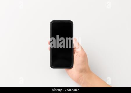 Nahaufnahme der Hand mit BlackBerry-Smartphones Stockfoto