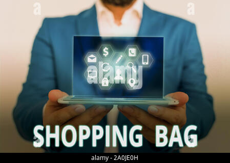 Konzeptionelle Hand schreiben Übersicht Shopping Bag. Begriff Sinne Behälter für den Transport von demonstratingal Besitz oder Erwerb Stockfoto