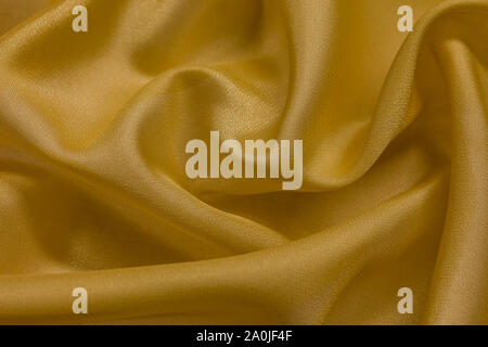 Glänzend Hintergrund Tuch mit beige vail Textil Stockfoto