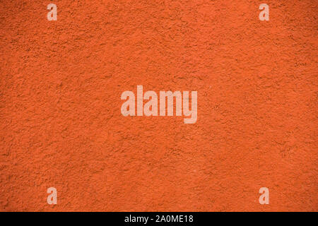 Orange Farbe Beton wand Textur Hintergrund Stockfoto