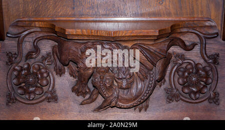 Misericords, St. Nikolaus-Kathedrale, Newcastle. Von Ralph Hedley c 1885 geschnitzt. Stockfoto