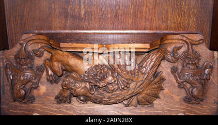 Misericords, St. Nikolaus-Kathedrale, Newcastle. Von Ralph Hedley c 1885 geschnitzt. Stockfoto