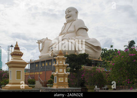 Vinh Trang Pagode. Smiling Buddha Statue in Vinh Trang Pagode. My Tho, Vietnam Stockfoto