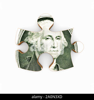Dollar Bill auf ein Puzzle Stück Stockfoto