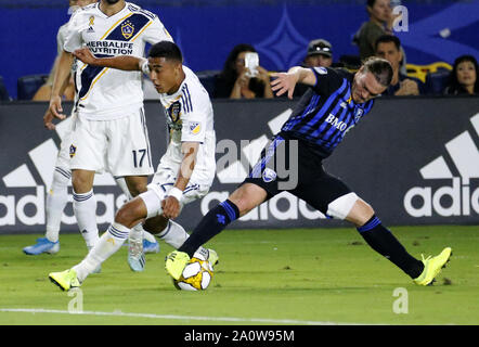 Los Angeles, Kalifornien, USA. 21 Sep, 2019. LA Galaxy Defender Julian Araujo (22) Mias gegen Montreal Impact Mittelfeldspieler Samuel Piette (6) während der 2019 Major League Soccer (MLS) Übereinstimmung zwischen LA Galaxy und Montreal Impact in Carson, Kalifornien, 21. September 2019. Credit: Ringo Chiu/ZUMA Draht/Alamy leben Nachrichten Stockfoto