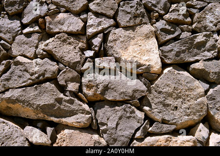 Traditionelle chemische Vulkangestein Wand in Puerto Calero, Lanzarote Stockfoto