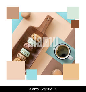 Farbanpassung ergänzende Palette von Macarons und Expresso, flach auf geometrischen Papier Hintergrund in Creme, Braun und Blau mint Farben Stockfoto