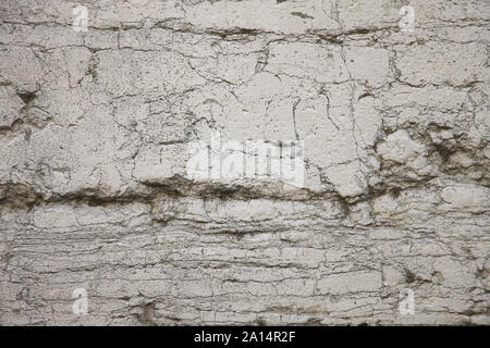 Alte einstürzende Verputzte Wand Stockfoto