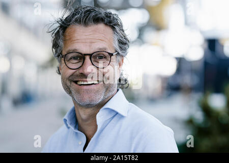 Porträt des Lächelns reifen Mannes Stockfoto