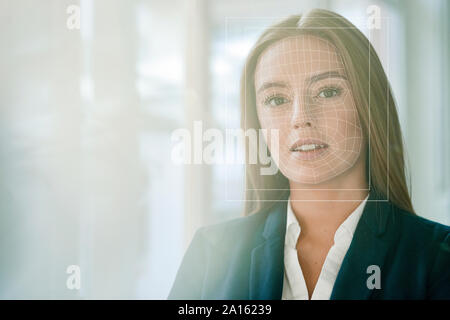 Gesichtserkennung, Geschäftsfrau mit Raster über Ihr Gesicht Stockfoto