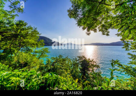 Österreich, Kärnten, Klagenfurt am Wörthersee, Worthersee bei Sonnenuntergang Stockfoto