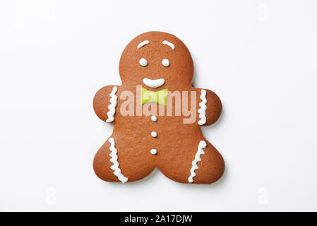 Die Handgefertigten essbar Lebkuchen kleiner Mann auf weißem Hintergrund Stockfoto