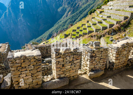 Antike Ruinen, Machu Picchu Sonnenaufgang, Heiliges Tal der Inkas, Peru. Steinmauern und landwirtschaftliche Terrassen, Machu Pichu Ruinen, frühmorgens. Stockfoto