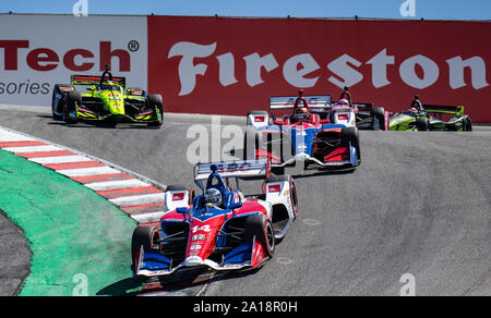 Monterey, CA, USA. 22 Sep, 2019. A. A.J. Foyt Unternehmen Fahrer Tony Kanaan (14) und Matheus Leist (4) Führt das Pack in der Korkenzieher während der Firestone Grand Prix von Monterey IndyCar Meisterschaft an Weathertech Raceway Laguna Seca in Monterey, CA Thurman James/CSM/Alamy leben Nachrichten Stockfoto