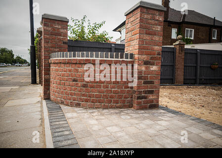 Gartenbau, blockwork, Mauerwerk, Pflaster & Fechten Stockfoto