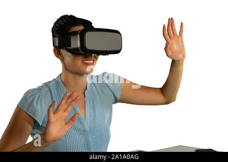 Junge Geschäftsfrau mit einem VR-Headset Stockfoto