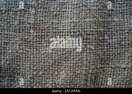 Hessische Sack gewebter Textur muster Hintergrund in hellem Creme Gelb Beige Farbe Stockfoto