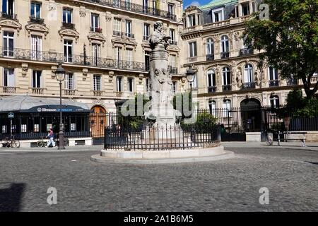 Brunnen mit der Büste von Illustrator Paul Gavarni (1804-1866) mit ein paar Leuten und eleganten Pariser Stadthäuser, Saint-Georges, Paris, Frankreich. Stockfoto