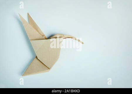 Origami Papier braun Kolibri Stockfoto