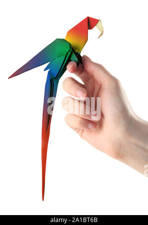 Origami ara Papagei auf einer Hand Stockfoto