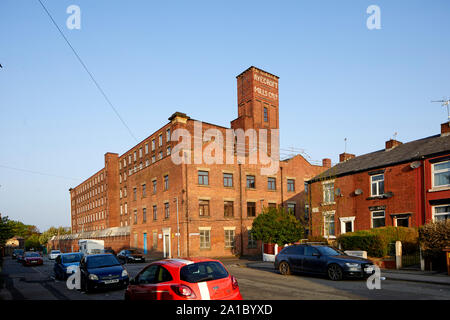 Tameside Wahrzeichen, aus rotem Backstein Tudno Mühle Smith St, Ashton-under-Lyne zu Hause Hill Kekse Ltd. Stockfoto